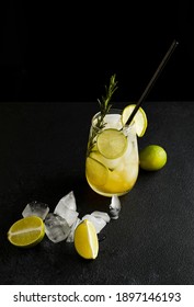 cocktail with lime on a black background