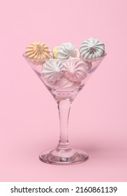 Cocktail Martini Glass With Sweet Meringue Isolated On Pink Background.