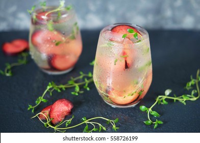 A Cocktail Of Prosecco With Plums And Thyme