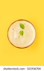 Cocktail Smoothie On Yellow Background, Top View