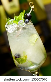 Cocktail With Vodka And White Wine, Grapes, Various Syrup, Lime Juice, Apple Juice And Mint