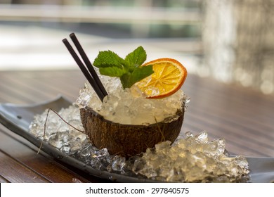 Cocktail With White Rum In A Coconut With Pineapple Juice