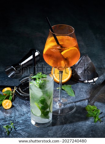 Cocktails assortment served on dark background. Classic drink menu concept. 