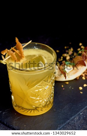 Cocktails with fire, lime, mint with side dishes at the club.