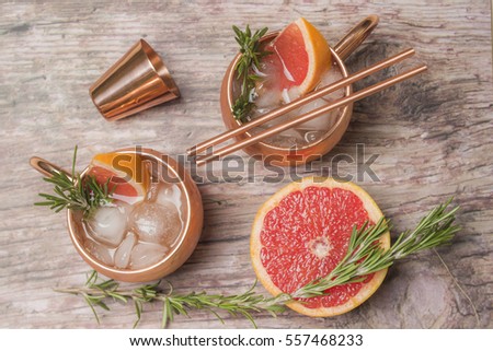 Cocktails with grapefruit ginger, vodka and rosemary