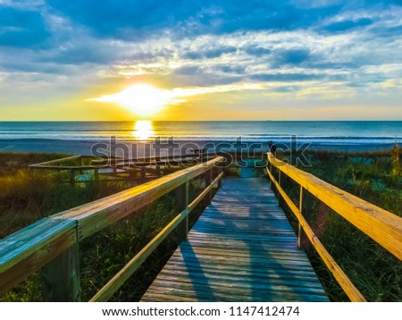 Cocoa Beach pier at Florida, Usa at sunset