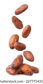 Cocoa beans are falling on a pile close-up on a white background. Isolated