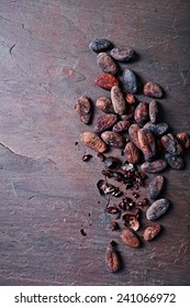 Cocoa Beans On Rustic Slate Background. Natural Food Ingredients. Flatlay