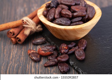 Cocoa beans on a wooden table