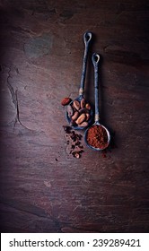 Cocoa Beans And Cocoa Powder On Rustic  Spoons. Super Foods. Copy Space. Flatlay