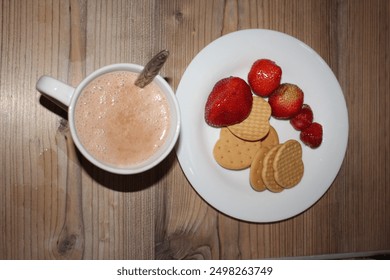 Cocoa and berries with cookies before bed - Powered by Shutterstock