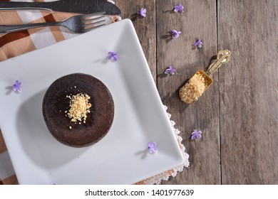 Cocoa Cake and nuts on table
