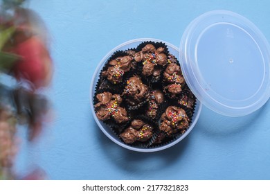 Cocoa Crunch Cereal Or Cornflakes. Chocolate Nuggets. Top View With Blue Background