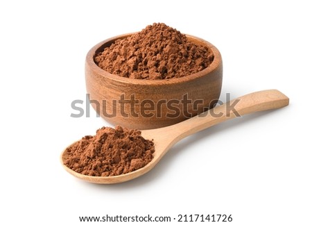 Cocoa powder in wooden bowl and spoon isolated on white background. 