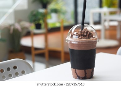 Cocoa Shake In A Plastic Cup Atmosphere In The Coffee Shop