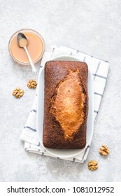 Coconut Caramel Pound Cake On Light Concrete Background. Top View, Space For Text.