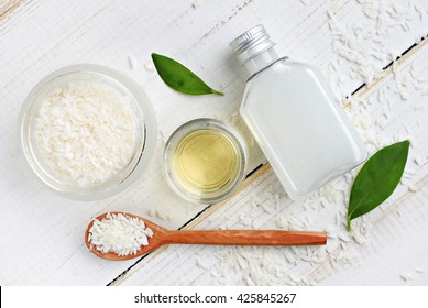 Coconut Cosmetic Products. Coconut Shavings, Oil, Milk. Healthy Skincare. Top View Background. 