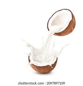 Coconut Cut In Half With Milk Splash Isolated On White Background