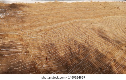 Coconut Fiber Soil Erosion Control Blankets Are Laid On Boundary Of A Construction Site. 