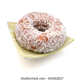 Coconut Flaked Plain Donuts Isolated In Plate On A White Background.