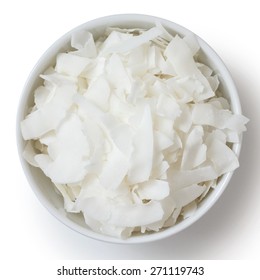 Coconut Flakes In White Ceramic Bowl. From Above.