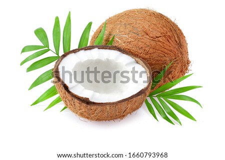 Coconut with green leaves isolated on white background