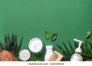 Coconut Hair Care flat lay, coconut and organic cosmetic products flat lay on green background with green leaves, top view, copy space. - Shutterstock ID 1633250545