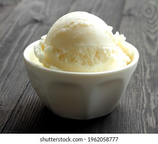 Coconut ice cream is sweet food on wood background. - Shutterstock ID 1962058777