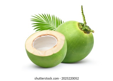 Coconut juice in half fruit with water droplets and leaf isolated on white background.