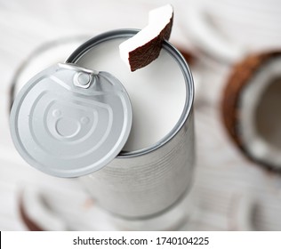 Coconut Milk In A Can With Slices Of Coconut