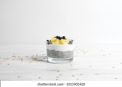 Coconut Milk Chia Pudding With Yoghurt, Granola And Berries