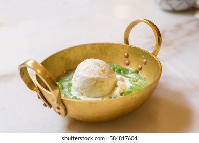 Coconut Milk Ice Cream on brass blow, Thai dish dessert 