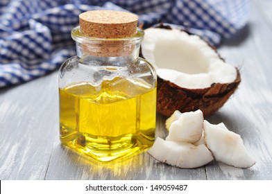 Coconut oil with fresh coconut for alternative therapy - Shutterstock ID 149059487