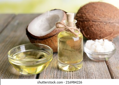 Coconut oil on table close-up - Shutterstock ID 216984226