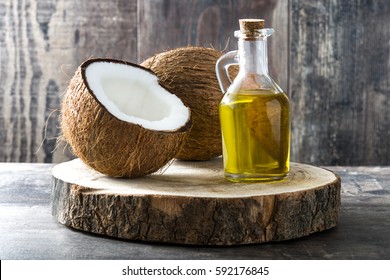 Coconut oil on wooden background
 - Shutterstock ID 592176845
