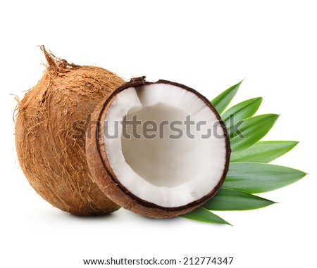 Coconut with palm leaves isolated on white.