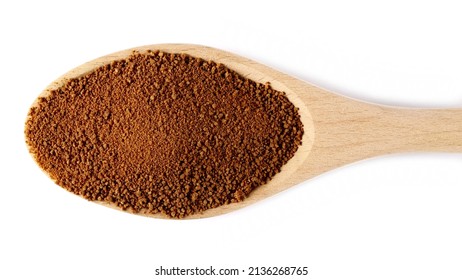 Coconut Palm Sugar Pile In Wooden Spoon Isolated Onview