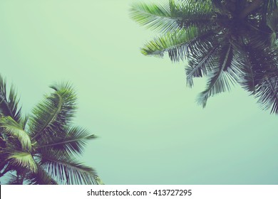 Coconut palm trees at tropical beach, vintage filter - Powered by Shutterstock