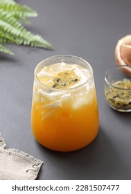 coconut passion fruit ice or es markisa kelapa muda, a typical Indonesian drink made from passion fruit syrup with fresh young coconut water, and young coconut meat. popular during ramadhan for takjil