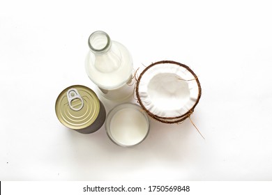 Coconut Products On A White Background Isolate, Lactose-free Milk, Fresh And Canned, Natural, Organic Coconut Products, Raw Materials For Industry