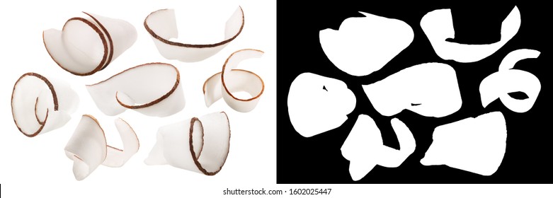 Coconut shavings, curls or rolled up slices of kernel meat, isolated with mask