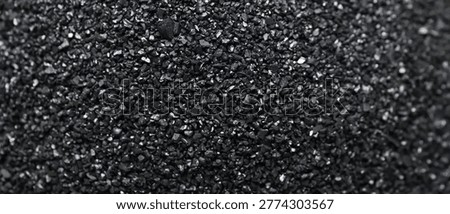 Coconut shell activated carbon as background, closeup