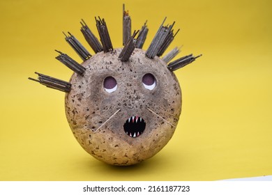 coconut shell emoticon texture. Evil, demon Emoji. Handmade design. New concept creative idea.