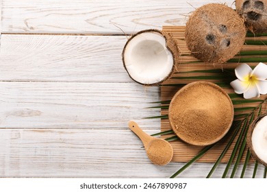 Coconut sugar, palm leaves, fruits and bamboo mat on wooden rustic table, flat lay. Space for text - Powered by Shutterstock