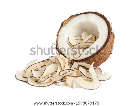 Coconut with tasty chips isolated on white