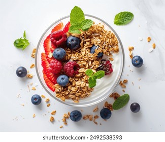 Coconut Yogurt Parfait | Layers of coconut yogurt, granola, and fresh berrie. - Powered by Shutterstock