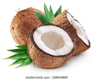 Coconuts and coconut half with leaves. File contains clipping paths. - Shutterstock ID 238454800