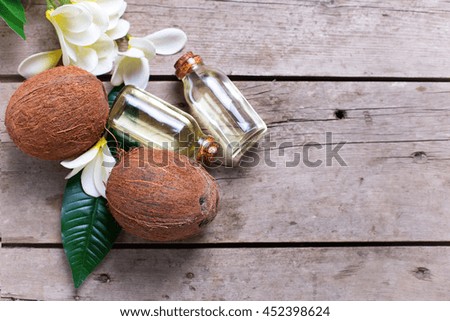 Similar – Image, Stock Photo Coconut oil in wooden bowl with spoon and moisturizing cream