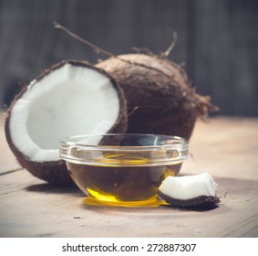 Coconuts And Organic Coconut Oil In A Glass Jar 