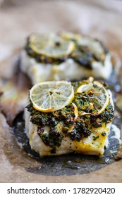 Cod fillets with coriander crust, lemon and bay leaf